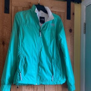The North Face Women's green lined raincoat. Size L